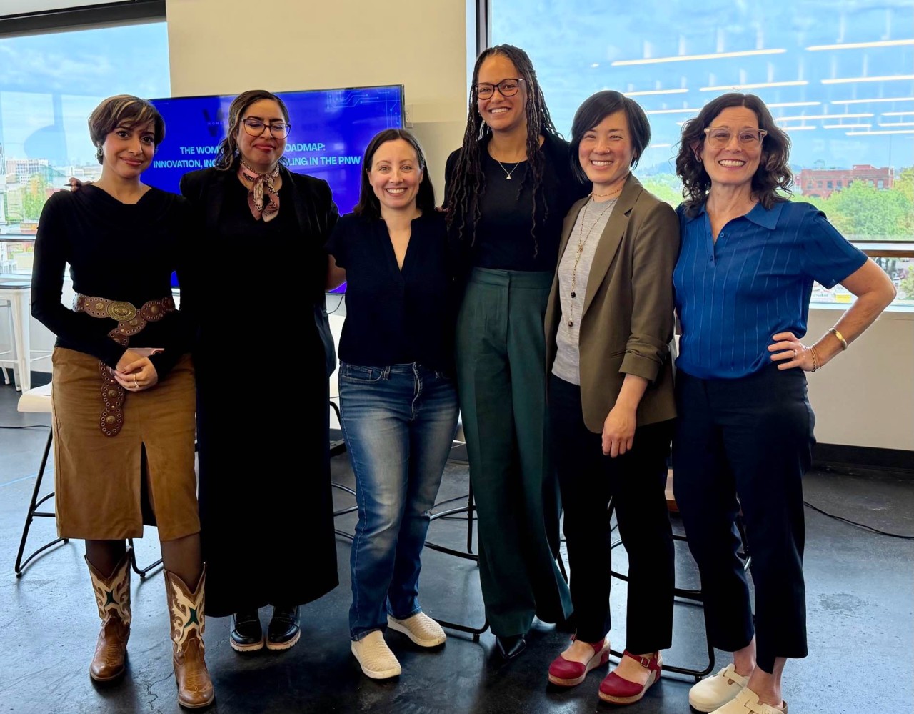 WSN founder with women panelists at a Pacific Northwest gathering